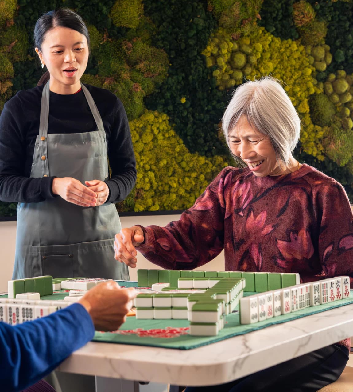 Healthcare worker assisting senior patient