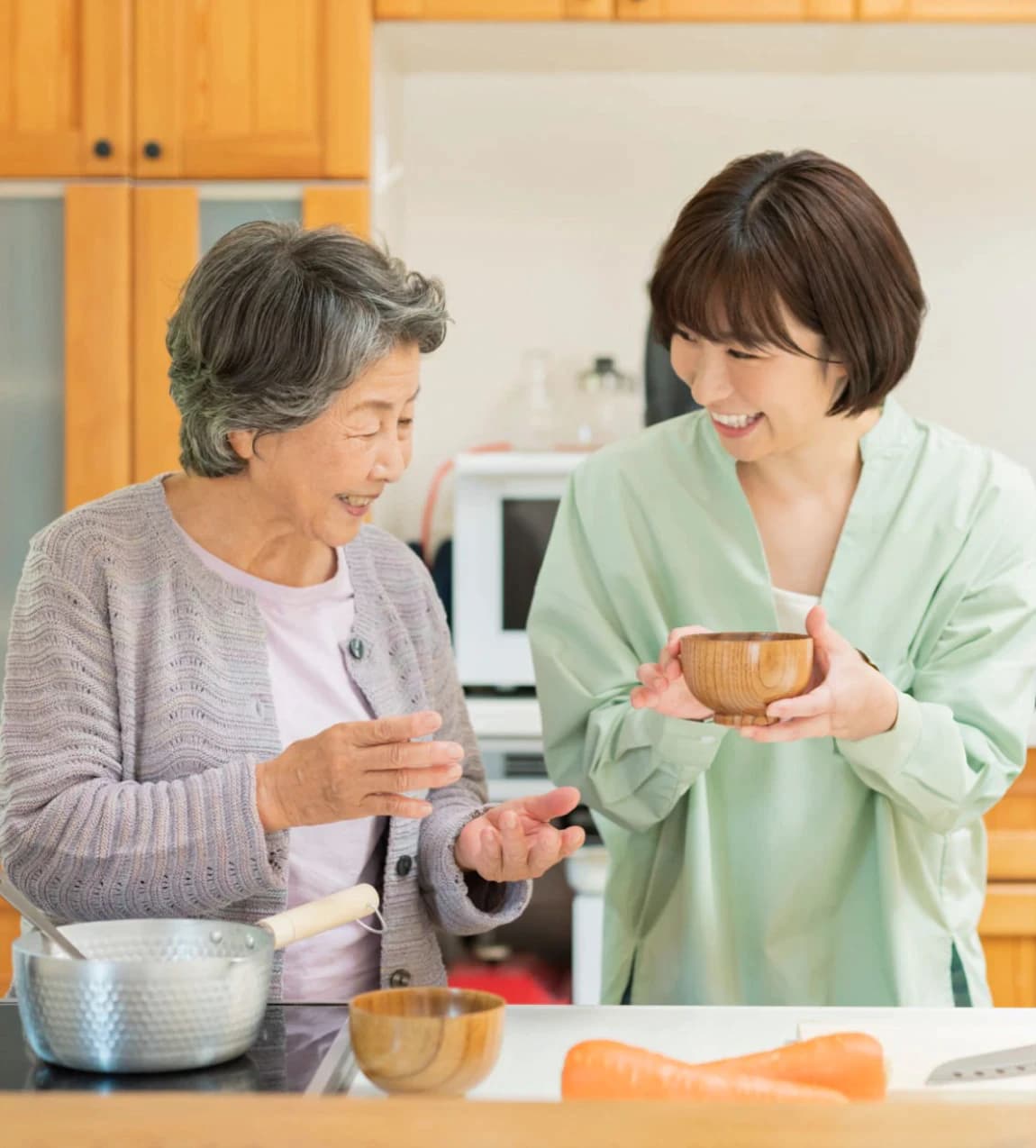 Healthcare worker assisting senior patient